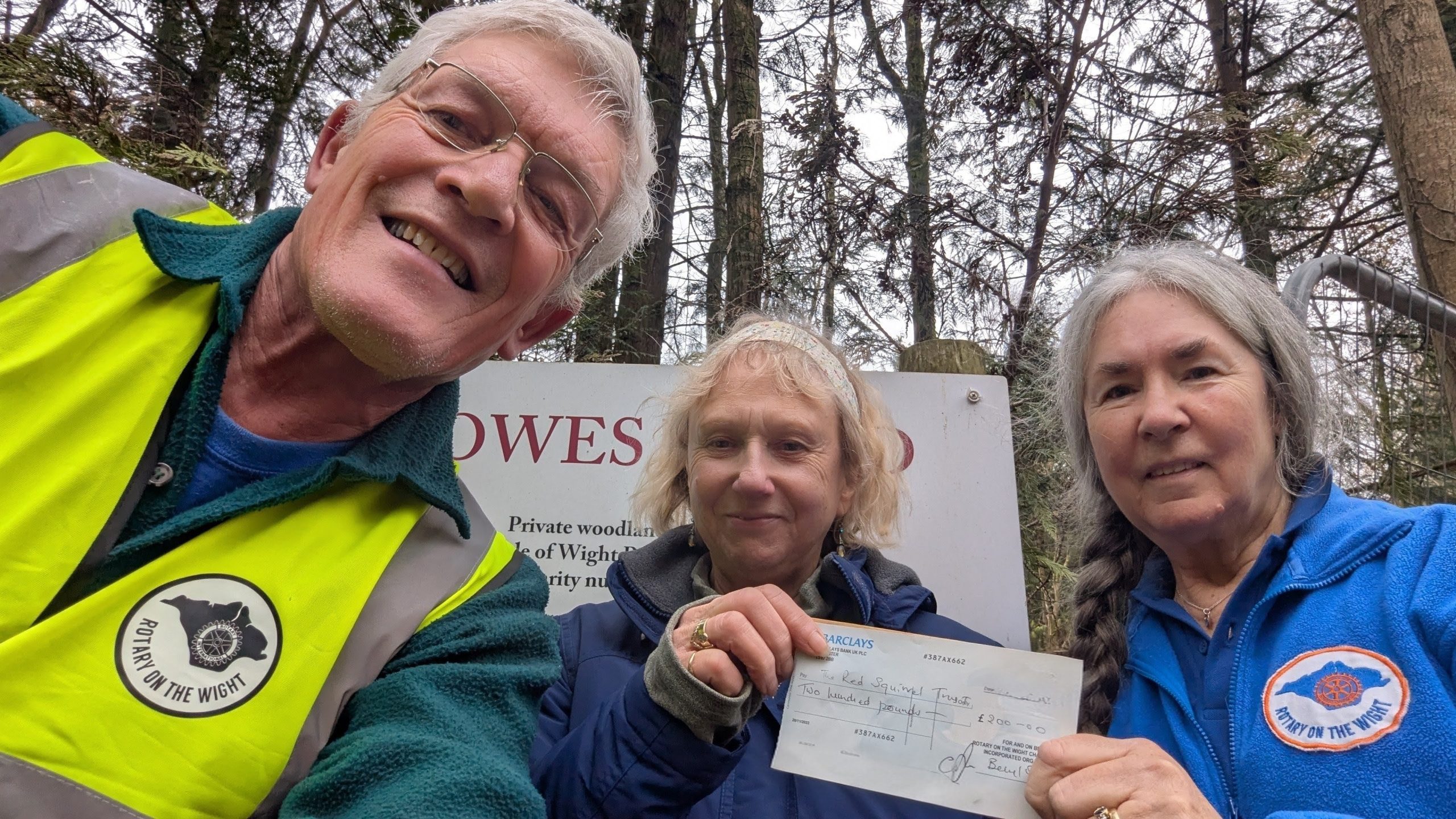 Helen Butler, Ian Pratt & Maria Reeves of the Rotary Club Ryde Rotary Club member Ian Pratt and President Maria Reeves presenting a £200 donation to support woodland conservation work.